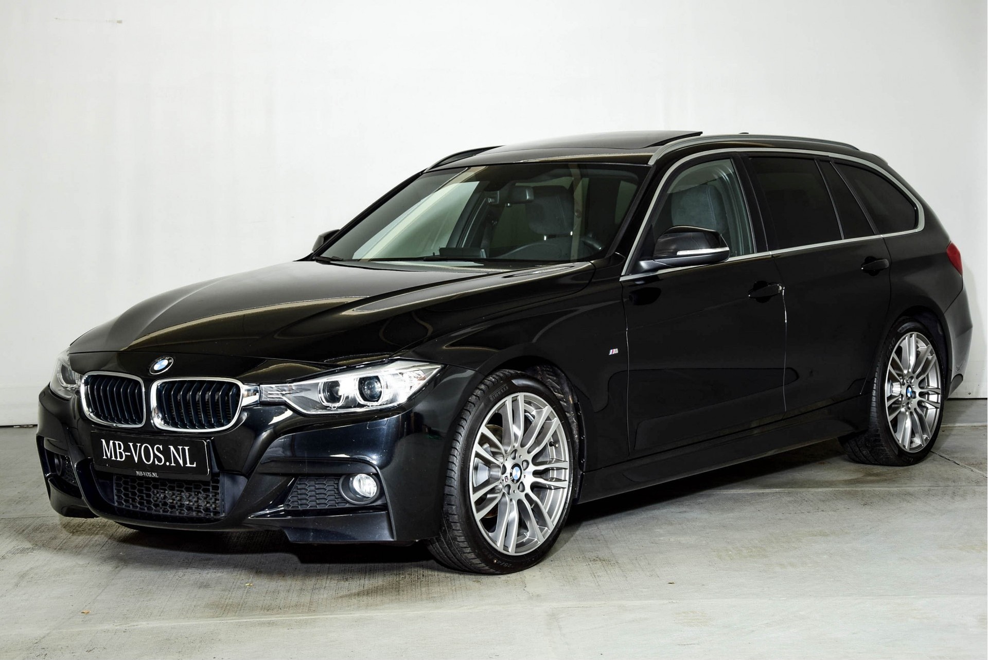 BMW 3 Serie Touring 318D High Executive M-Sportpakket Panorama/19"/Keyless Aut8 Foto 1