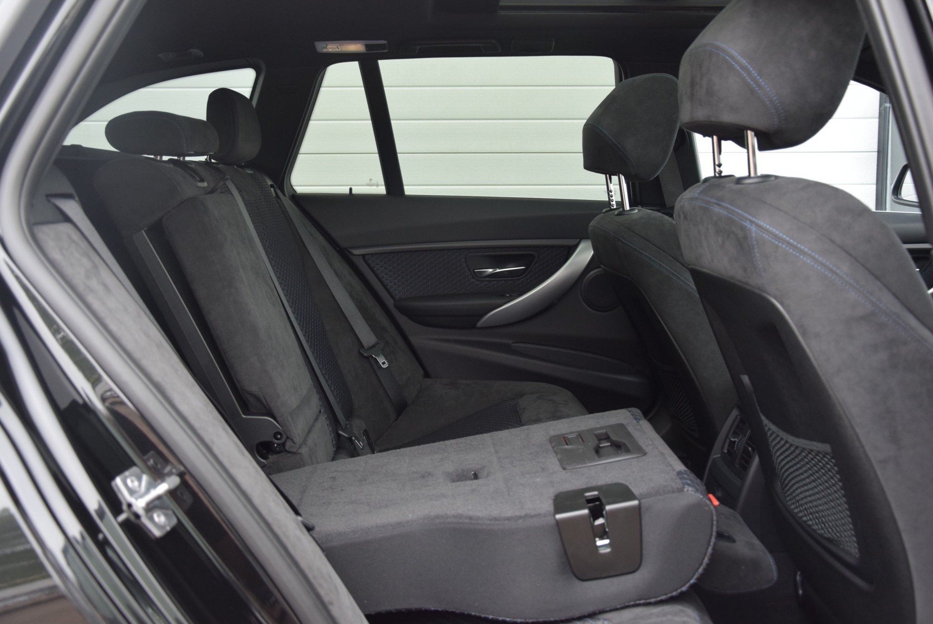 BMW 3 Serie Touring 318D High Executive M-Sportpakket Panorama/19"/Keyless Aut8 Foto 5