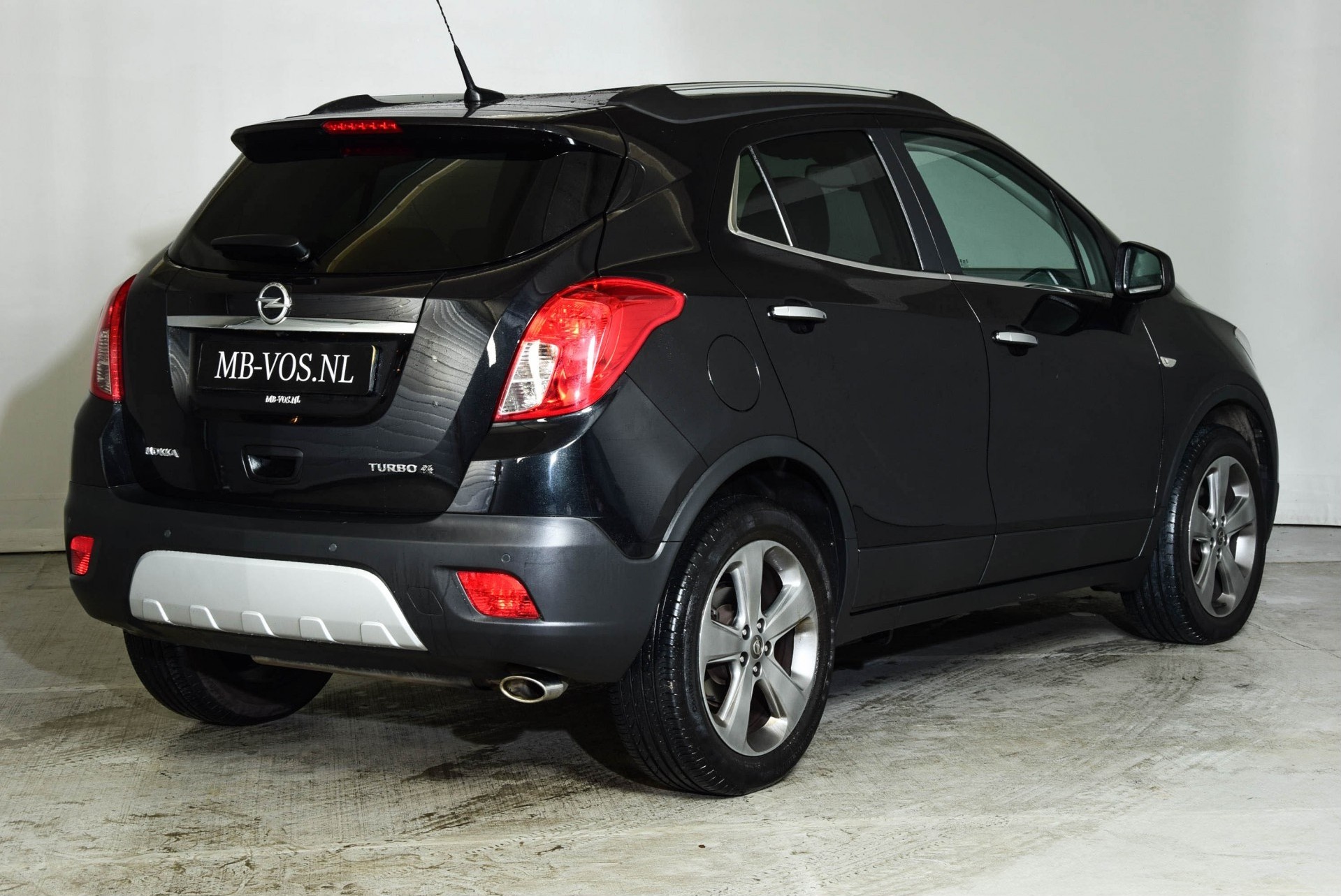 Opel Mokka 1.4 T COSMO 4X4 Leer/Navi/Schuifdak 140 pk 1ste eigenaar Foto 2