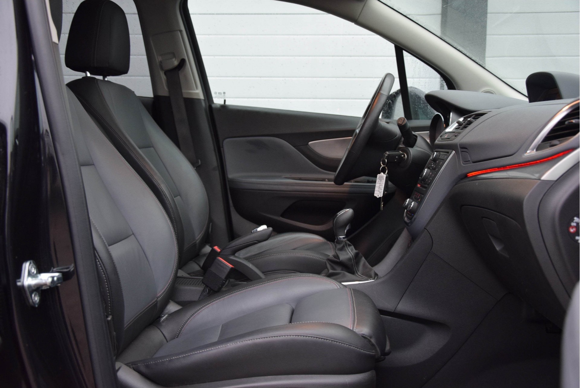 Opel Mokka 1.4 T COSMO 4X4 Leer/Navi/Schuifdak 140 pk 1ste eigenaar Foto 3