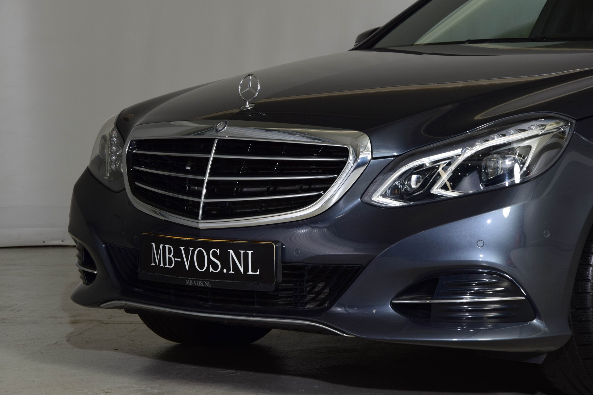 Mercedes-Benz E-Klasse 200 CGI Massage/Keyless/Dak/Com/Camera/ILS/Entertainment Aut7 Foto 21