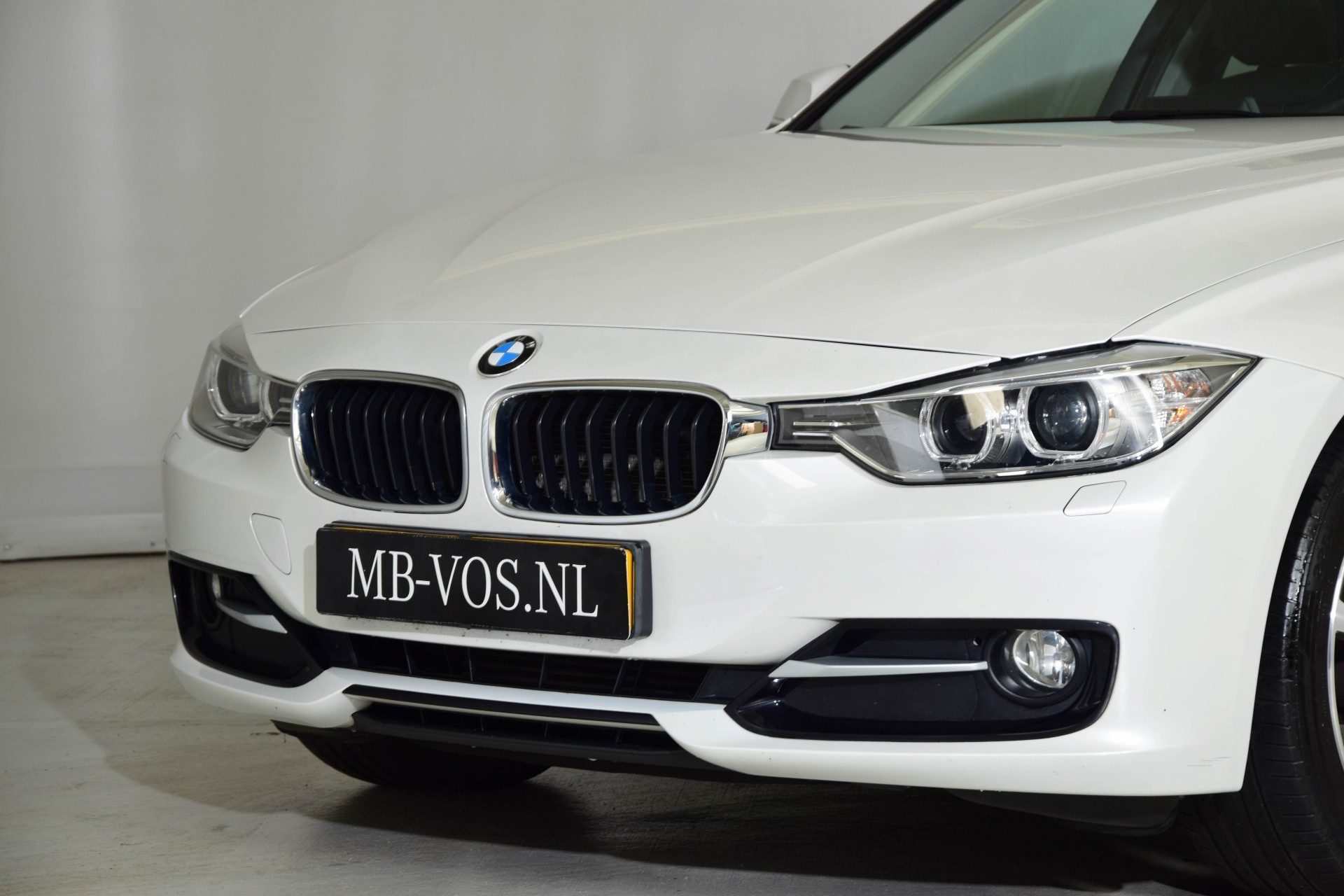 BMW 3 Serie 320D Upgrade Edition Sport Schuifdak/Leer/Xenon Aut8 Foto 16