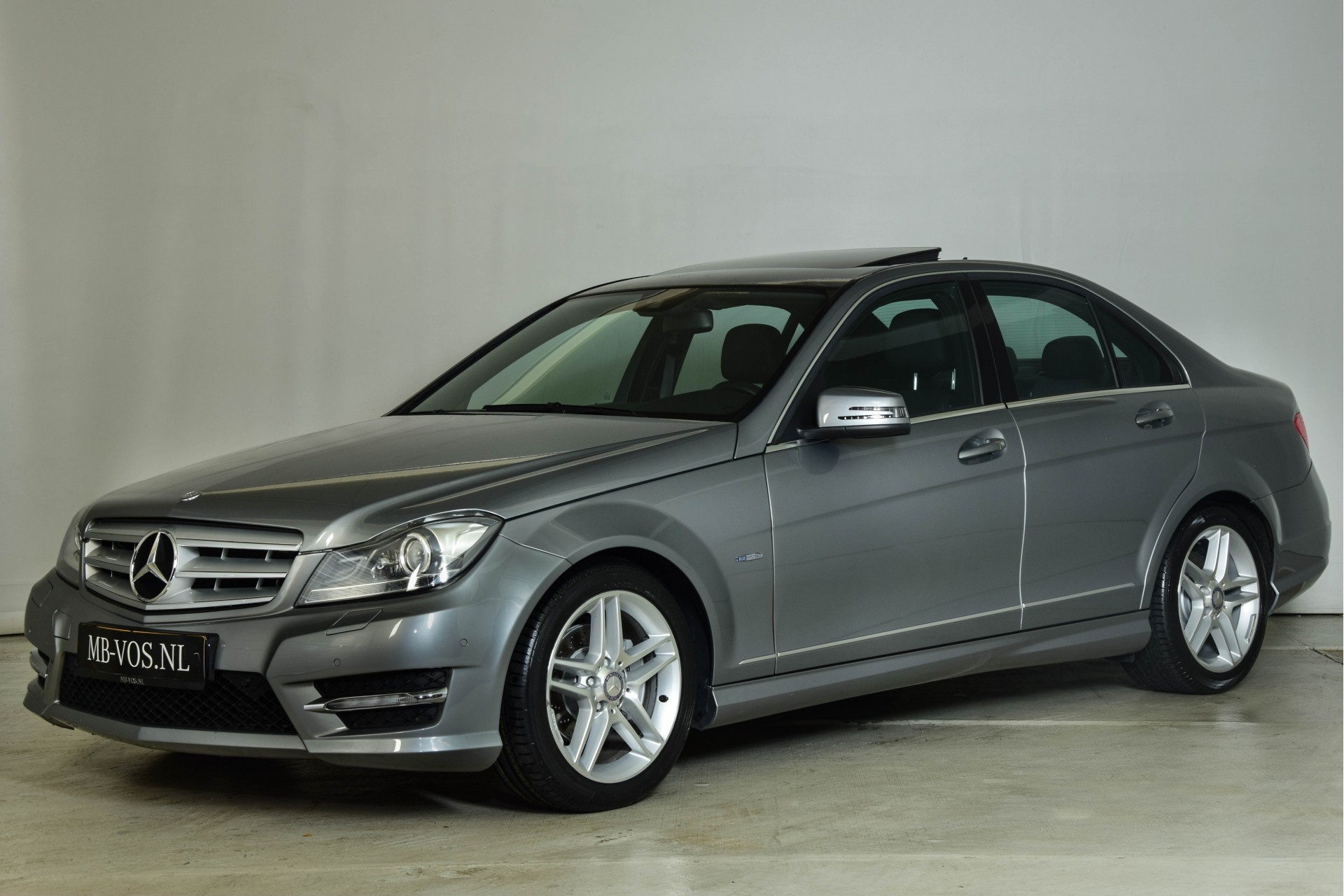 Mercedes-Benz C-Klasse 180 Cgi AMG Facelift Schuifdak/Navi/Wisselaar/ILS Aut7 Foto 1