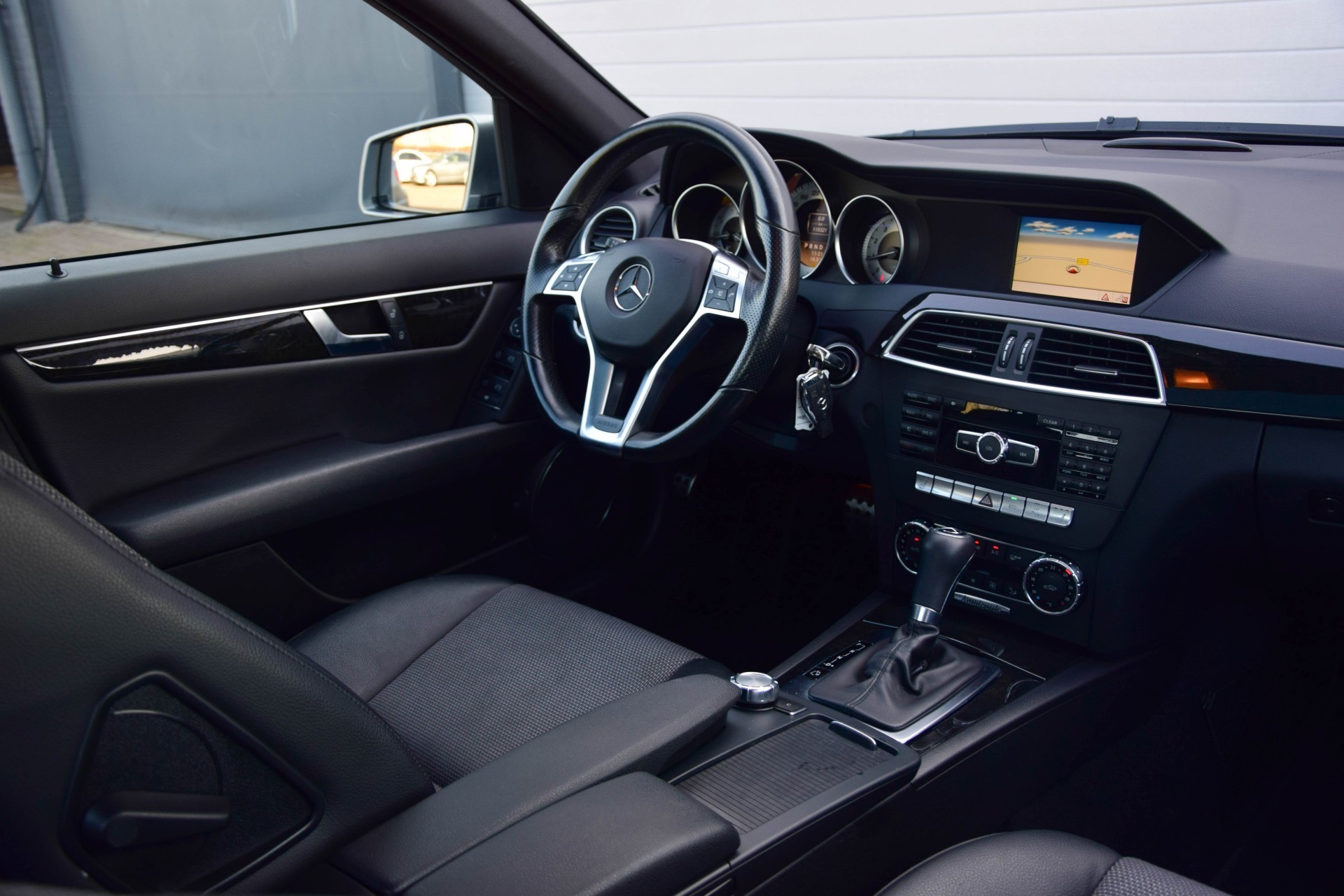 Mercedes-Benz C-Klasse 180 Cgi AMG Facelift Schuifdak/Navi/Wisselaar/ILS Aut7 Foto 5