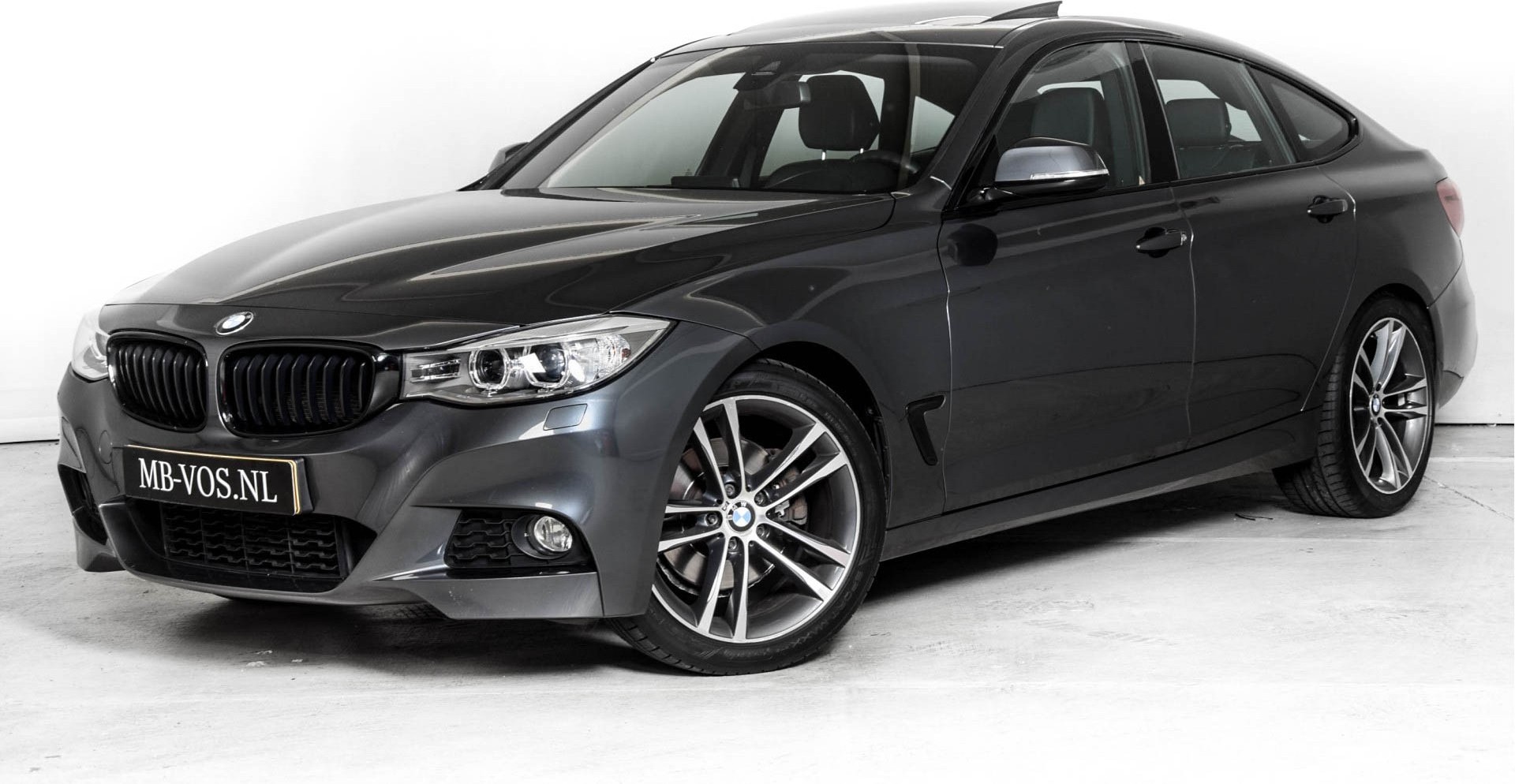 BMW 3 Serie Gran Turismo 328i High Executive M-pakket/Keyless/Navi/Pano-schuifdak/Head-Up/Camera Aut8 Foto 1