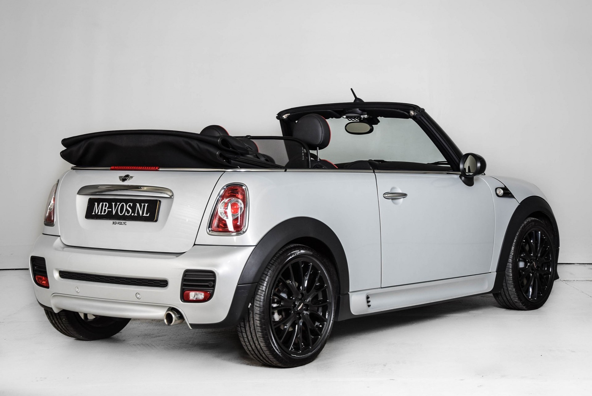 MINI Cabrio 1.6 Cooper JCW-pakket Navi/Leder/Xenon/Stoelv/Pts/ECC Foto 3