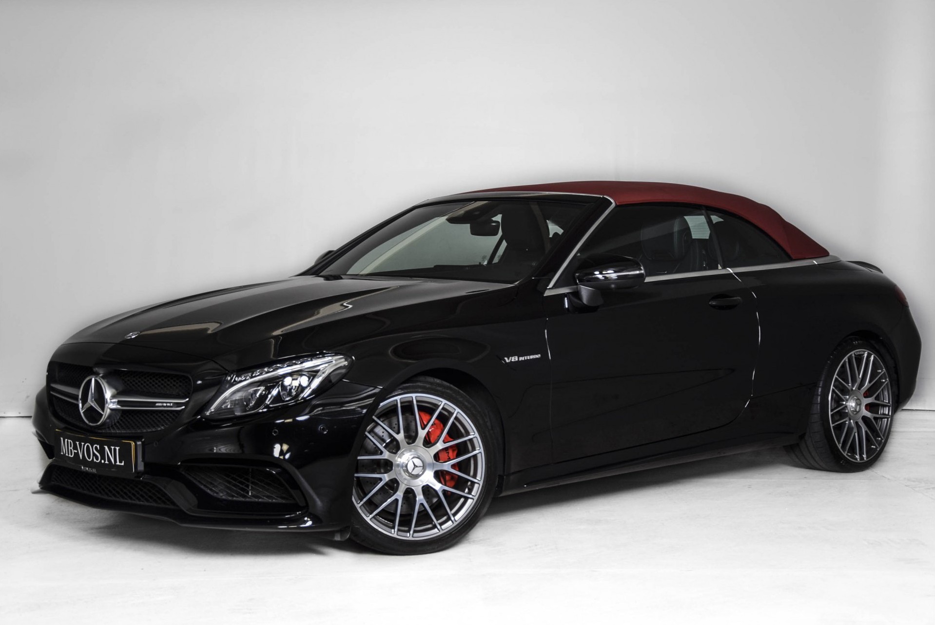 Mercedes-Benz C-Klasse Cabrio 63 AMG Night Carbon Aut7 met rode cabriokap Foto 2