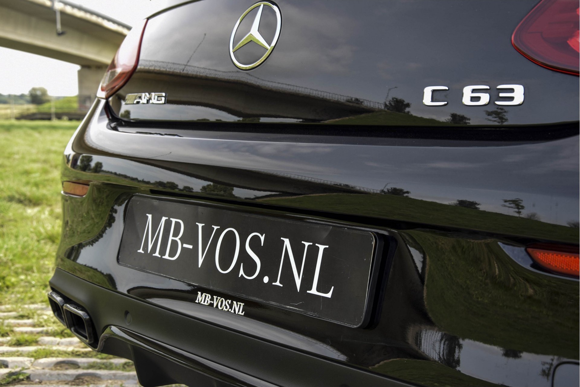 Mercedes-Benz C-Klasse Cabrio 63 AMG Night Carbon Aut7 met rode cabriokap Foto 32