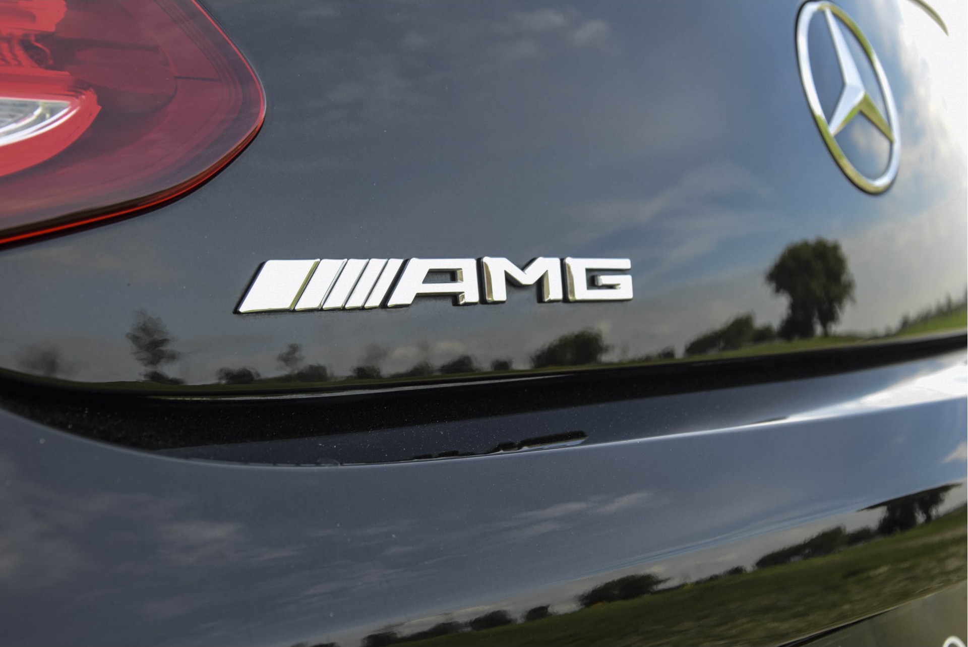 Mercedes-Benz C-Klasse Cabrio 63 AMG Night Carbon Aut7 met rode cabriokap Foto 34