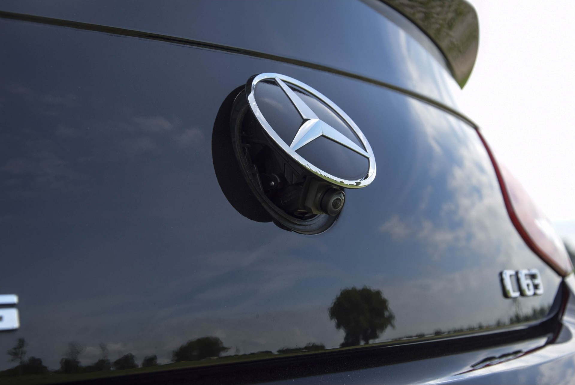 Mercedes-Benz C-Klasse Cabrio 63 AMG Night Carbon Aut7 met rode cabriokap Foto 35