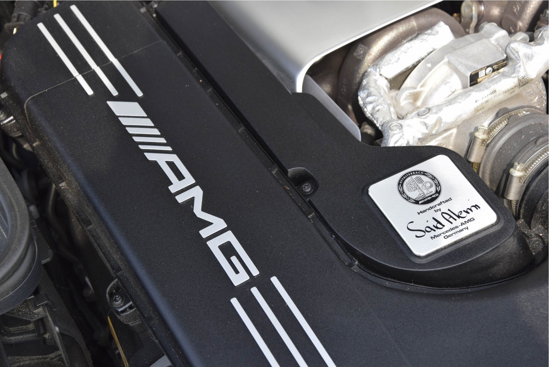 Mercedes-Benz C-Klasse Cabrio 63 AMG Night Carbon Aut7 met rode cabriokap Foto 38