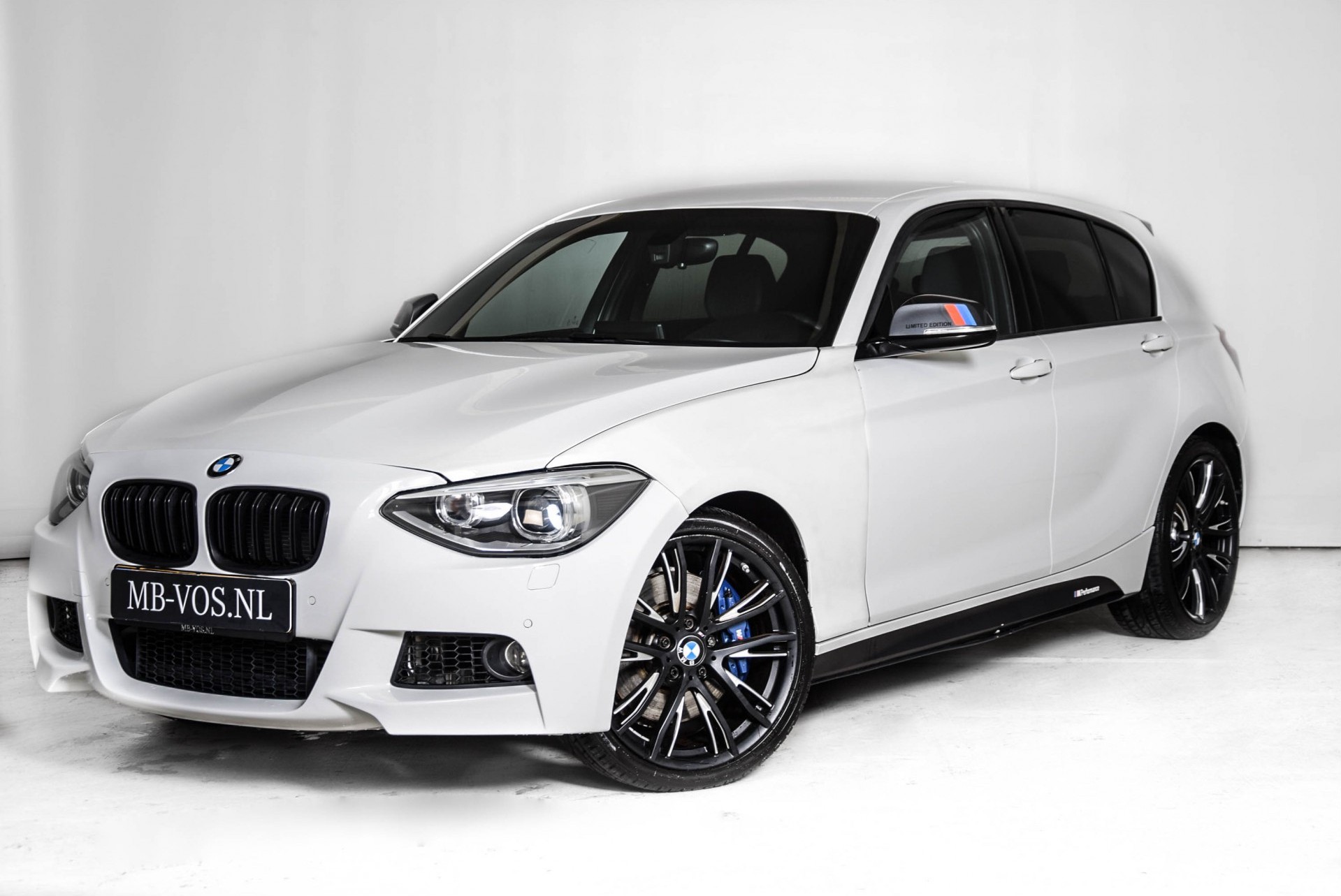 BMW 1 Serie M135i xDrive High Executive M-Performance/ Aerodynamica/Camera/DAB Aut8 Foto 1