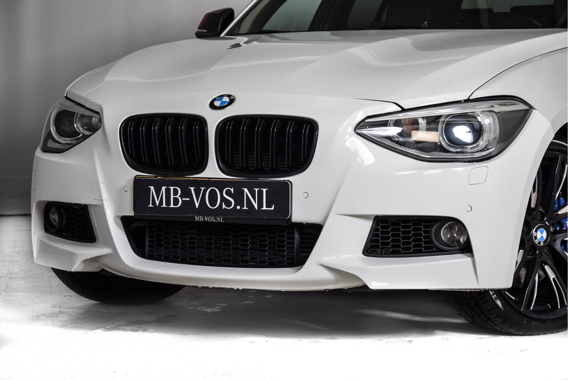 BMW 1 Serie M135i xDrive High Executive M-Performance/ Aerodynamica/Camera/DAB Aut8 Foto 18