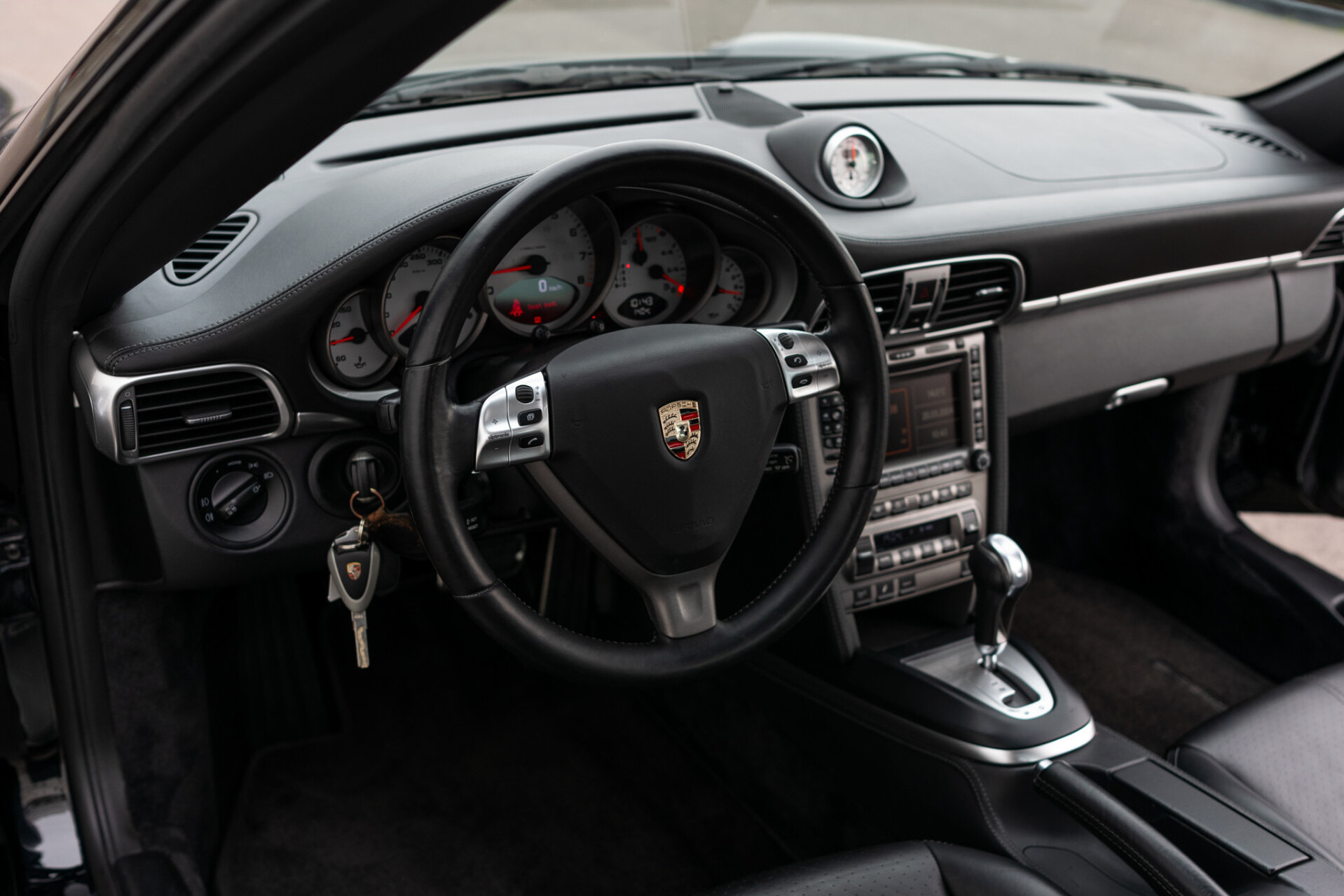Porsche 911 3.8 Carrera 4S Origineel Nederlands | Volledige historie | Bose | Sportchrono Plus | Sportuitlaat | Schuifdak Foto 8