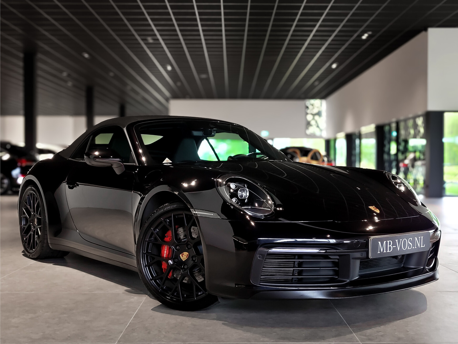 Porsche 911 Cabrio 3.0 Carrera 4 S Sport Design nieuwstaat Foto 2