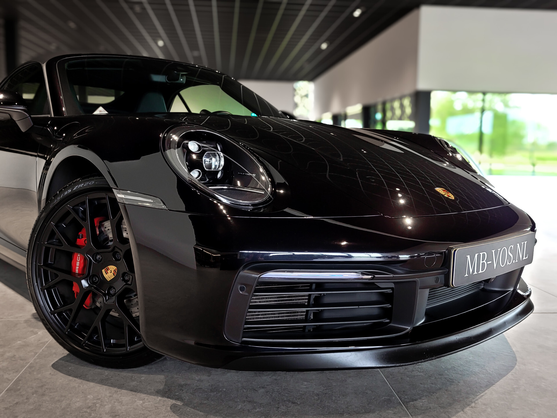 Porsche 911 Cabrio 3.0 Carrera 4 S Sport Design nieuwstaat Foto 27