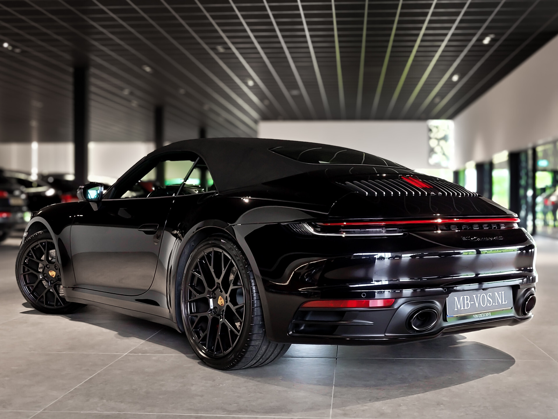 Porsche 911 Cabrio 3.0 Carrera 4 S Sport Design nieuwstaat Foto 4