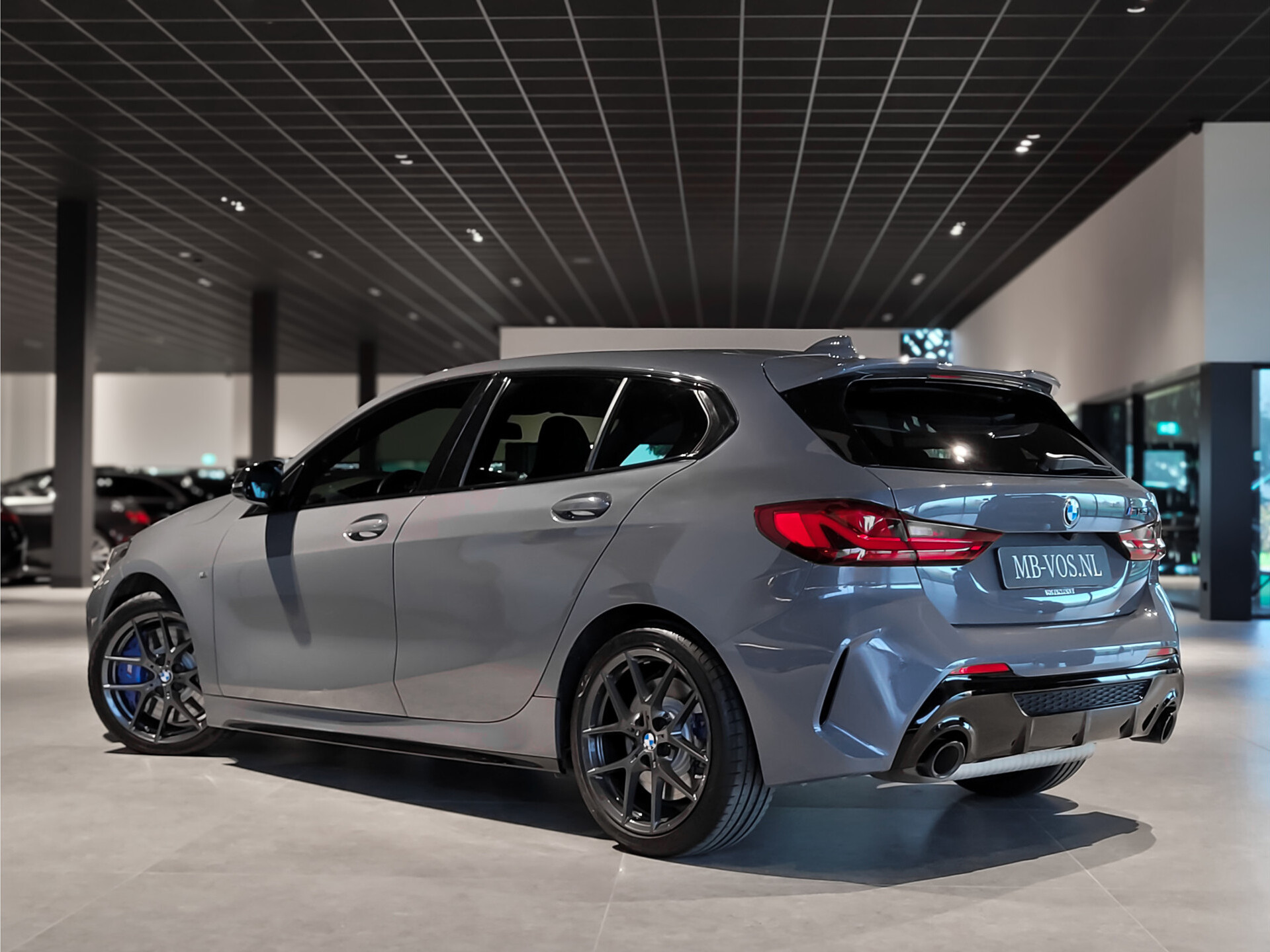 BMW 1-serie M135i xDrive Performance | Aerodynamica | Sportstoelen | Harman-Kardon | Active Guard | LED Foto 2