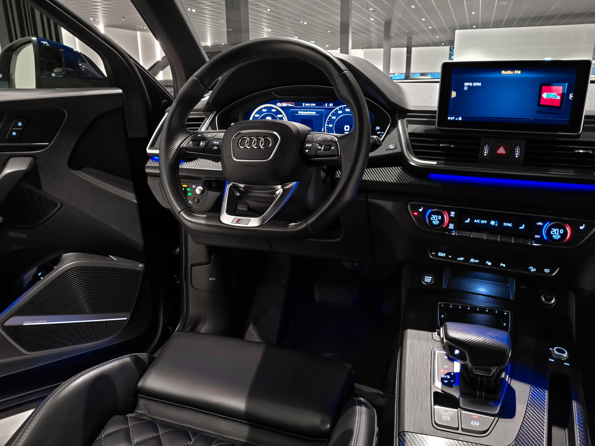 Audi Q5 55 TFSI e quattro Competition Luchtvering | HUD | B&O | Panorama | 22" | Trekhaak | ACC Foto 28