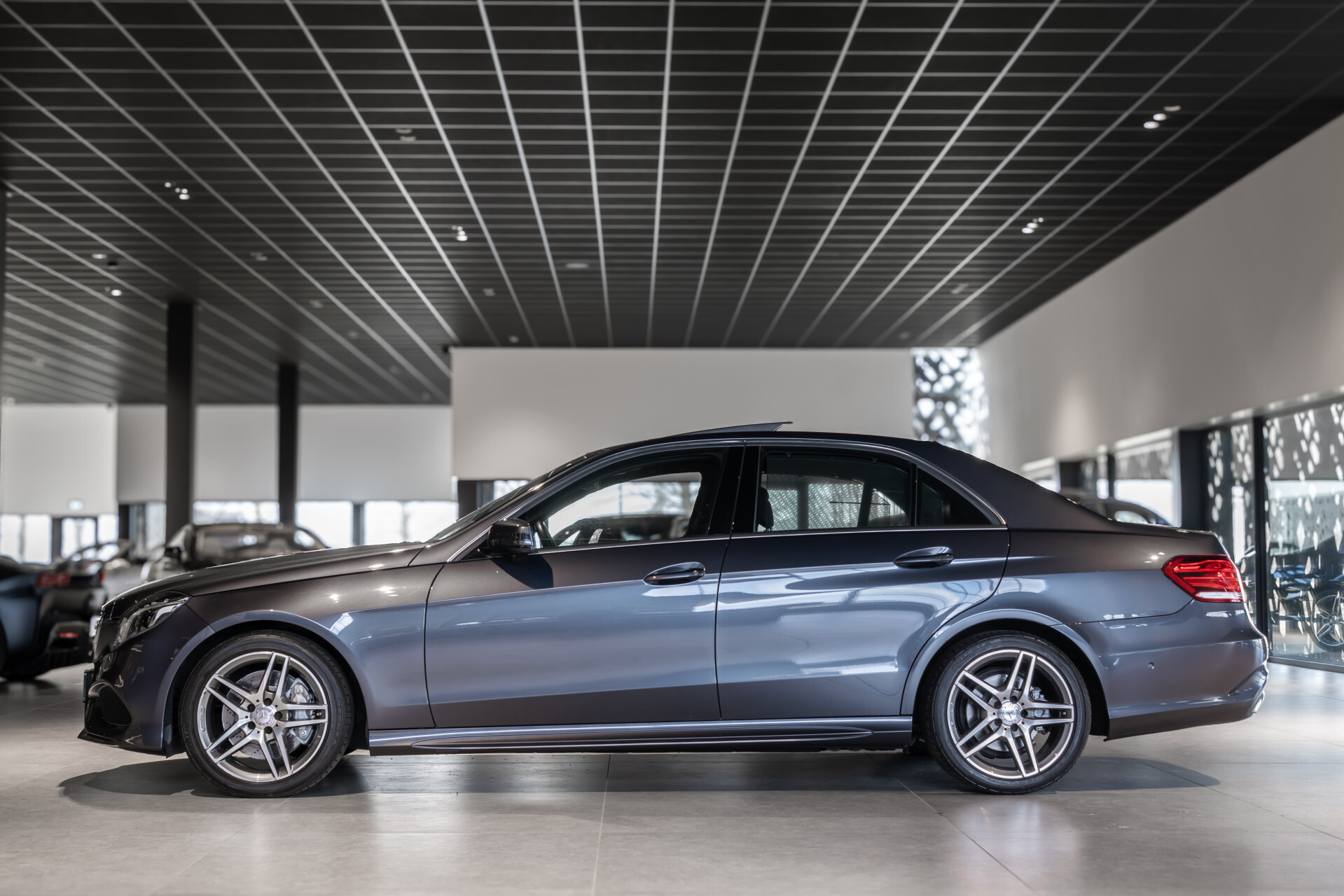 Mercedes-Benz E-Klasse 400 AMG Panorama | ACC | Harman-Kardon | Camera | Zonweringpakket | Volledige historie Foto 4