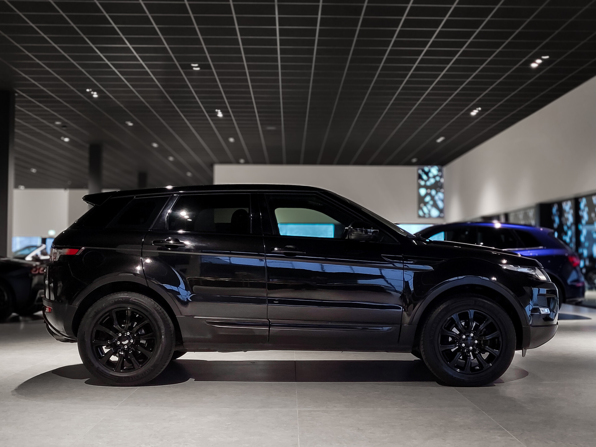 Land Rover Range Rover Evoque 2.0 Si 4WD Pure Business Edition Panorama | Meridian | Blackline | Trekhaak | NL Auto | New Service Foto 3