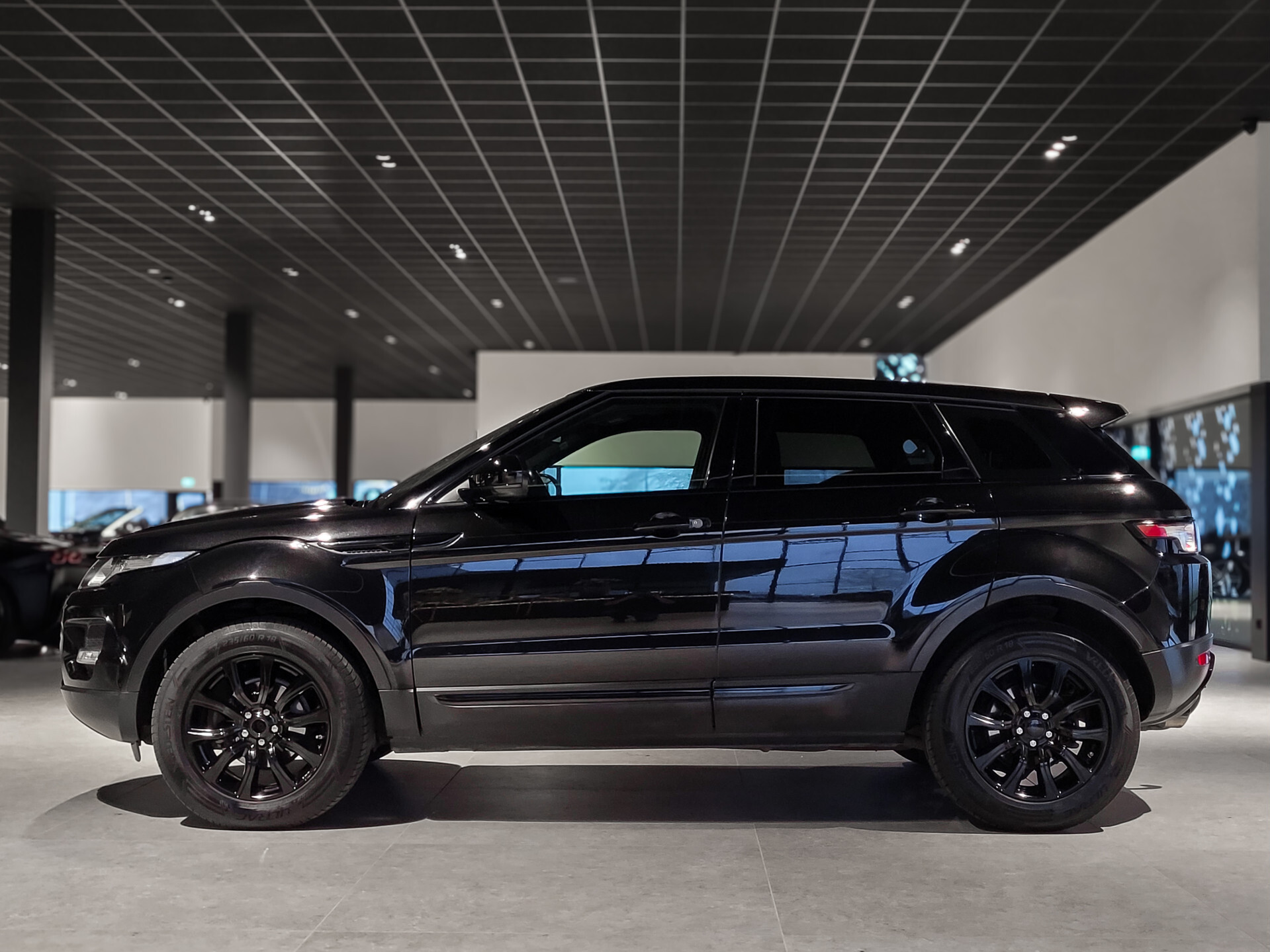 Land Rover Range Rover Evoque 2.0 Si 4WD Pure Business Edition Panorama | Meridian | Blackline | Trekhaak | NL Auto | New Service Foto 4