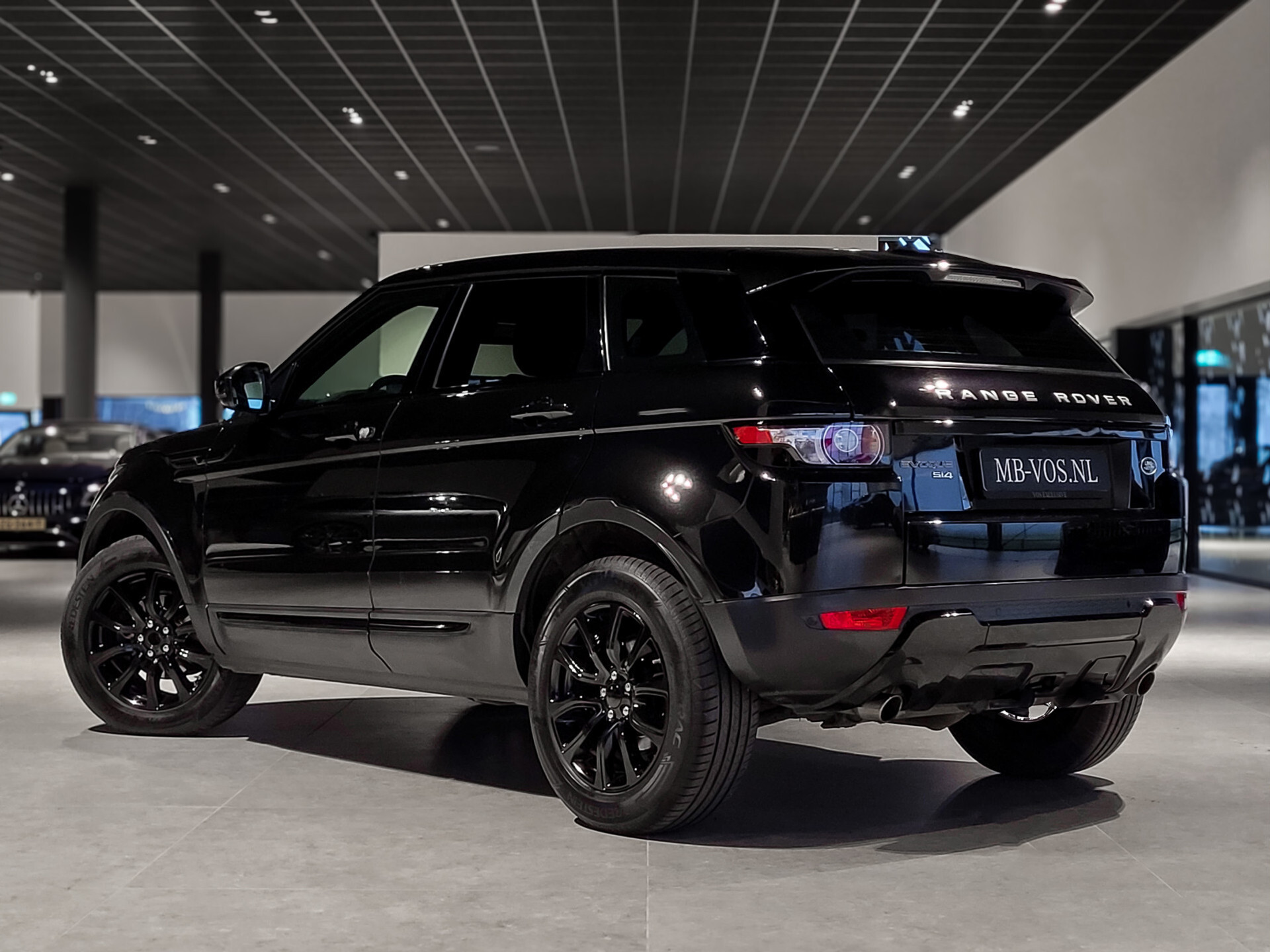 Land Rover Range Rover Evoque 2.0 Si 4WD Pure Business Edition Panorama | Meridian | Blackline | Trekhaak | NL Auto | New Service Foto 2