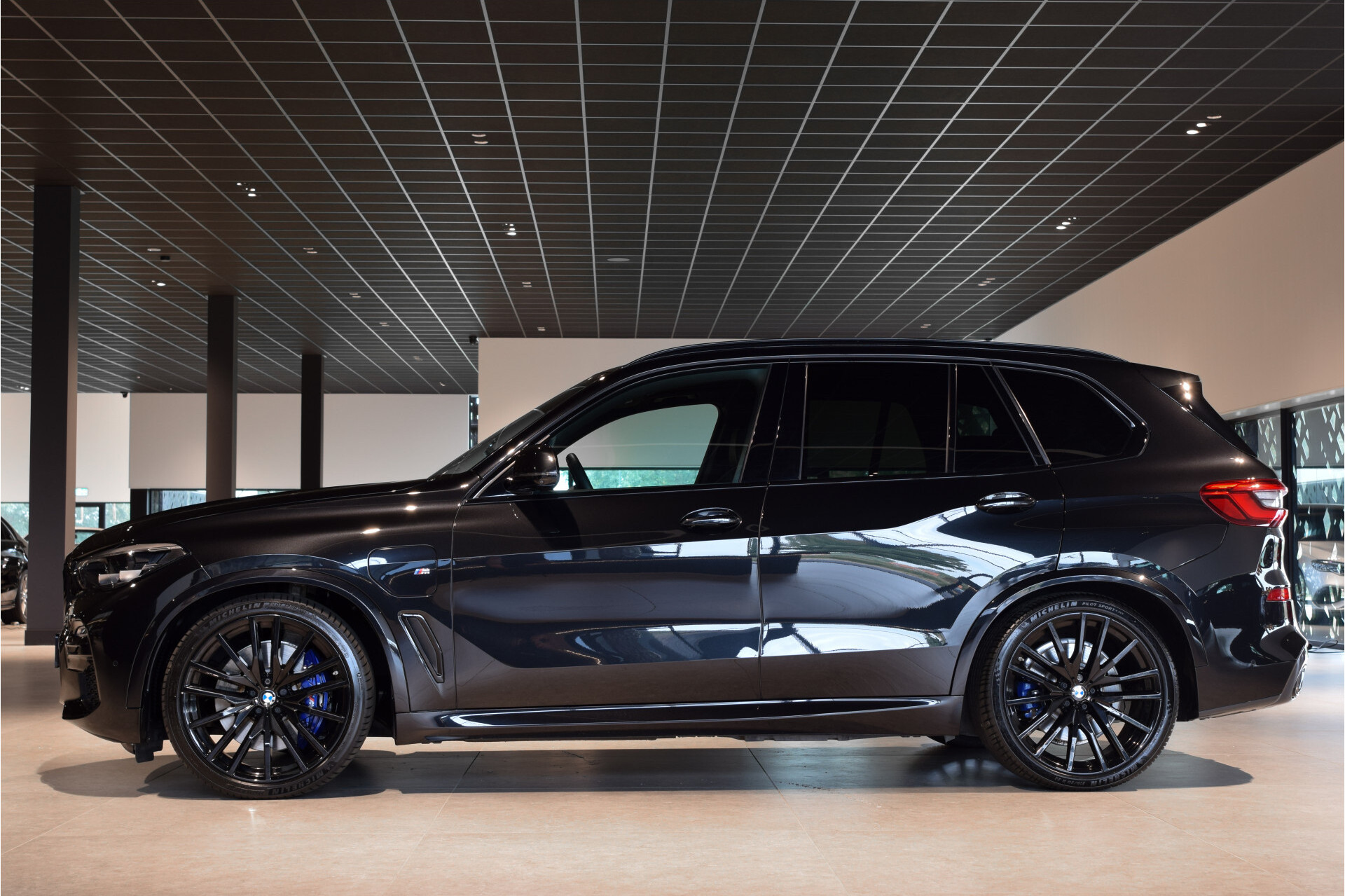 BMW X5 xDrive45e M Sport Active Steering | Luchtvering | ACC | Shadow | High Executive | Comfortacces | 22" | Harman-Kardon Foto 4