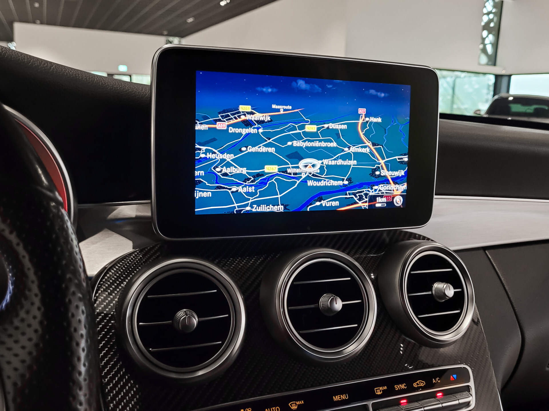 Mercedes-Benz C-Klasse 200 AMG Leder | Carbon | Burmester | 20" | ILS | Comand | Sfeerverlichting | Memory | Volledige historie Foto 13