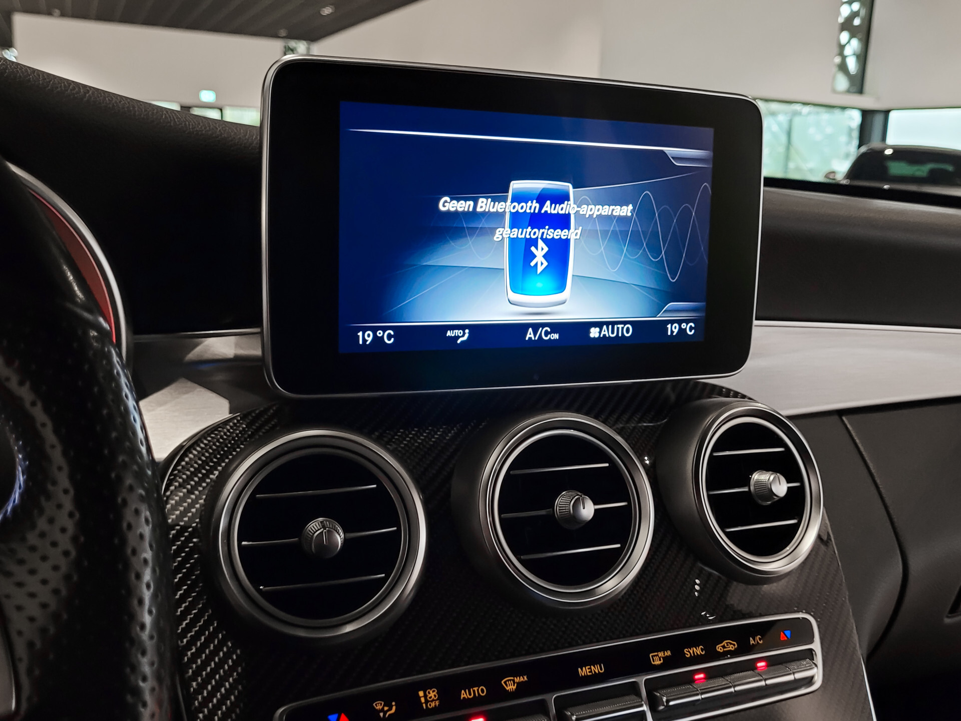 Mercedes-Benz C-Klasse 200 AMG Leder | Carbon | Burmester | 20" | ILS | Comand | Sfeerverlichting | Memory | Volledige historie Foto 15