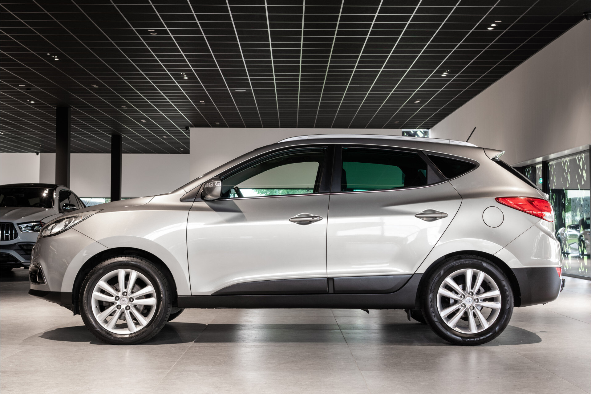 Hyundai ix35 2.0i i-Catcher Pano | Leder | Keyless | Camera | Cruise |  | Trekhaak | Navi | Orig.NL | Foto 4